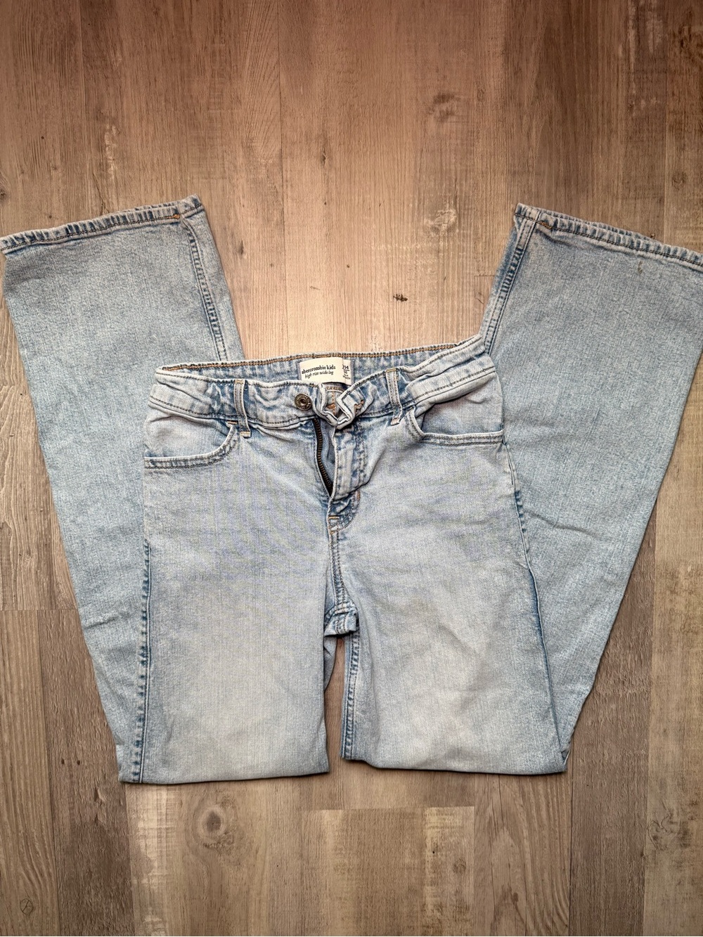 Abercrombie Kids High Rise Wide Leg jeans in a light blue wash, size 14.